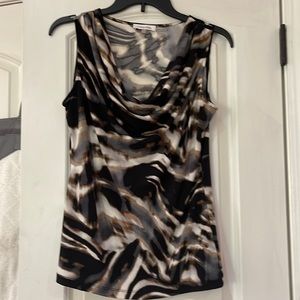 Calvin Klein top with pretty neckline. Excellent condition. Size small.